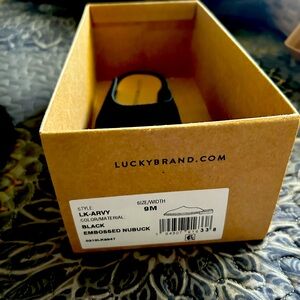 Lucky Brand slides. Only wore once. Super clean home. Hard to let go